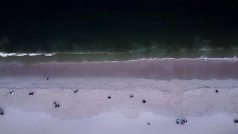 Sea Waves Top Down View with some people in the sand Stock Footage 249624298