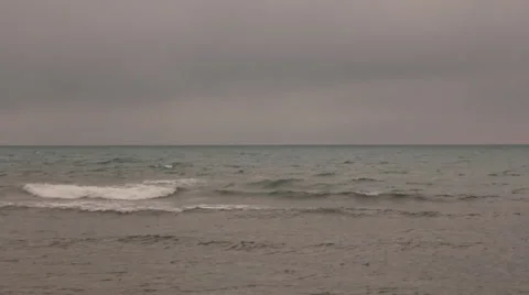 Sea waves under lead sky Stock Footage 64915315