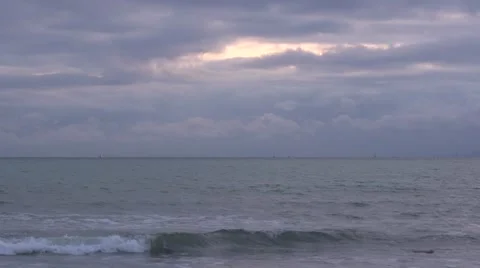 Sea waves under thunderclouds. Video stock 53089879
