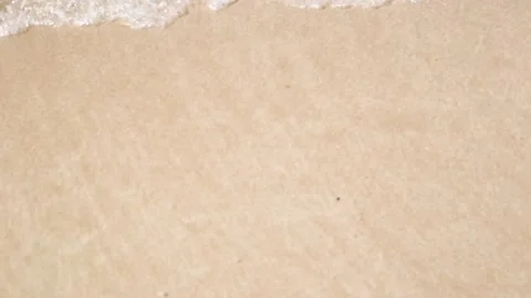 Sea waves wash the sandy beach . Video stock 150417071