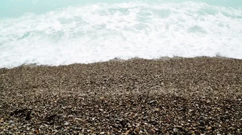 Sea waves washes pebble beach. Video stock 61566546
