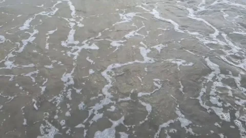 Sea Waves Washing Over Sandy Shoreline Close Up Stock Footage 332629480