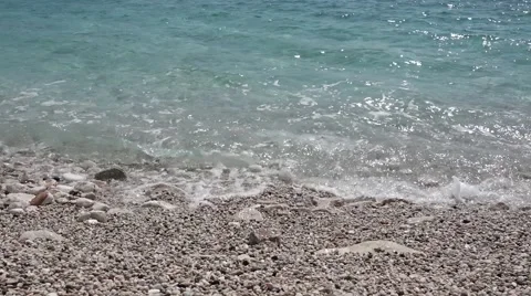 Sea waves washing pebbles Stock Footage 61425784