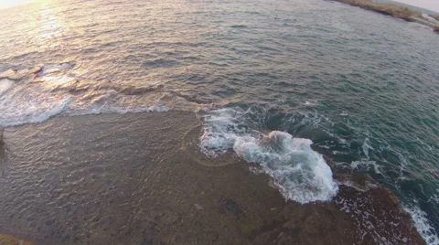 Sea waves washing white rocks on sunset, Israel Stock Footage 47299514