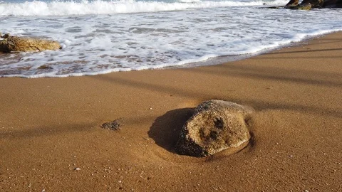 Sea waves. Water flows on the sand. Coast. Sea. Stock Footage 118525786