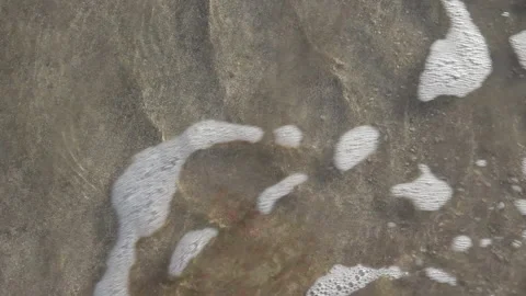 Sea waves water on a sandy beach the shore at low tide. Stock Footage 138652089