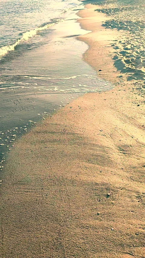 Sea waves with white foam rolling sandy beach seashore sunny autumn day Stock Footage 292100667