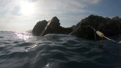 Sea weaves hiting rocks Stock Footage 160624320
