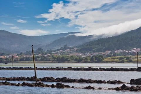 A sea of white clouds going down the mountains to the village of Noia in Gali Stock Photos