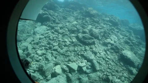 Seabed and rocks seen through the submarine Stock Footage 99079412
