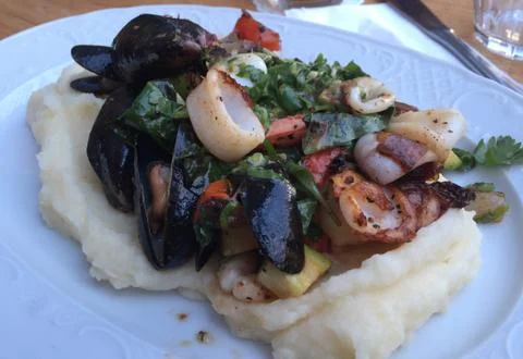 Seafood and mashed potatoes Stock Photos