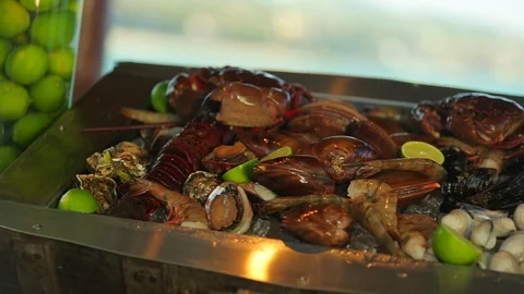 Seafood and shellfish on ice ready to be cooked. pan right Stock Footage 107156736
