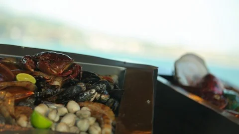 Seafood and shellfish on ice ready to be cooked. pan left Stock Footage 107156747