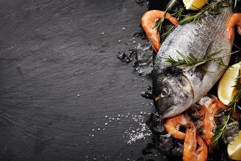 Seafood on black background Fotos Stock