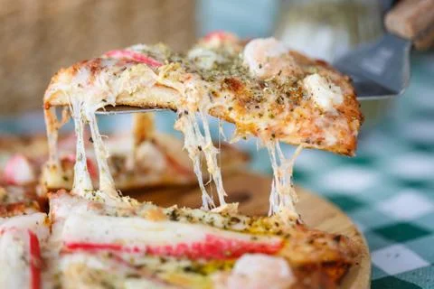 Seafood cheese pizza serving on the table Stock Photos