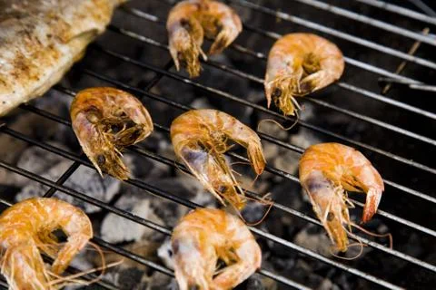 Seafood on grill Stock Photos