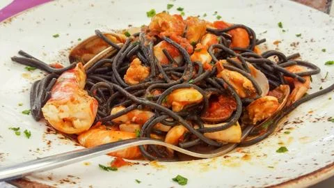 Seafood pasta close up in italian restaurant Stock Photos