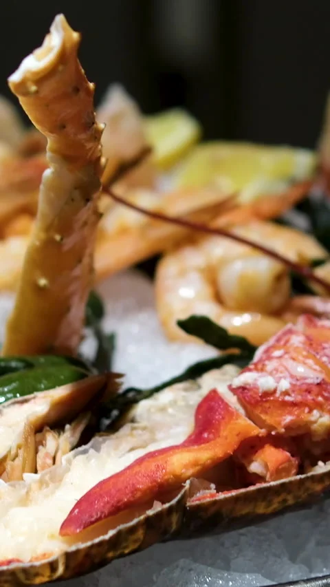 Seafood platter ice Elegant Salmon Sashimi Platter on Ice with Floral Garnish Stock Footage 309534249