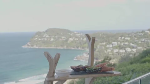 Seafood Platter Served Outdoors Overlooking Coastal Scenery in Sydney, Australia Stock Footage 345725895