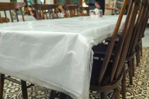 Seafood restaurant dining table with plastic base for easy cleaning Stock Photos