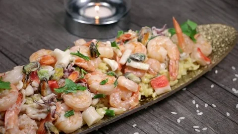 Seafood Risotto With Candle Flame Stock Footage 82902893