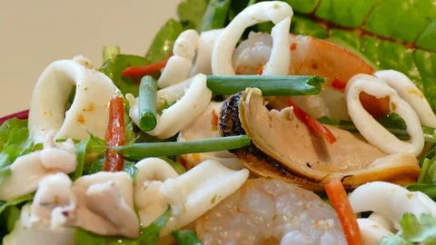 Seafood salad with fresh vegetable Stock Footage 77658039