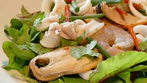 Seafood salad with fresh vegetable Stock Footage 77799181