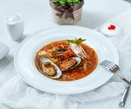 Seafood soup on the table Stock Photos