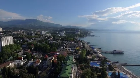 Seafront of Alushta in Crimea from drone in spring with piers cuts Black sea Stock Footage 78766971