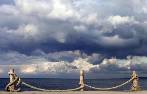 Seafront and cloudy storm sky in autumn Foto stock