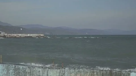 Seafront and pier with huge waves Stock-Footage 2923527