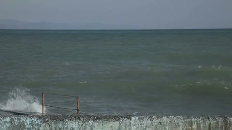 Seafront and pier with huge waves Stock Footage 2923538