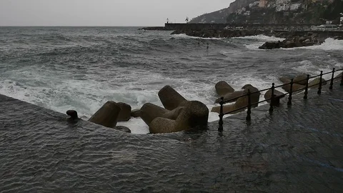 Seafront And Pier With Huge Waves Stock Footage 86498745