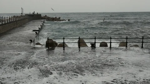 Seafront And Pier With Huge Waves Stock Footage 86500943