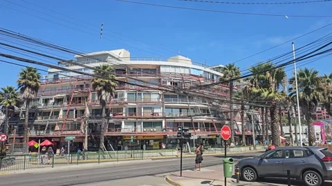 Seafront Block with Power Lines and Palms, Viña del Mar, Chile 8K Stock Footage 331545663