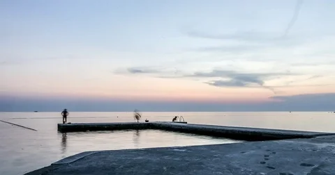 Seafront with fishermans Stock Footage 74261164