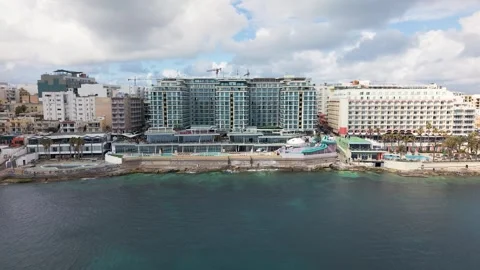 Seafront Hotels Along the Coast of Saint Paul's Bay Malta 스톡 동영상 337700855