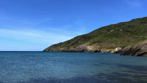 Seafront isolated house built on rocks of Corsica, France Stockbeeldmateriaal 277513775