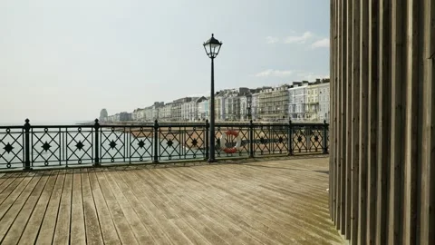 Seafront properties in Hastings seen from the pier 6K Stock Footage 330050174