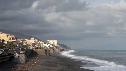 Seafront road of a small town in eastern Sicily Stock Footage 97817126