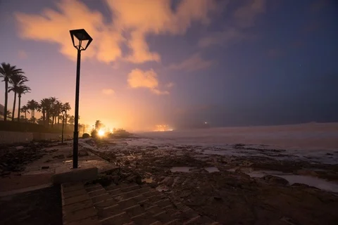 Seafront Storm Aftermath With Aggressive Ocean And Lighthouse Stock Footage 123703168