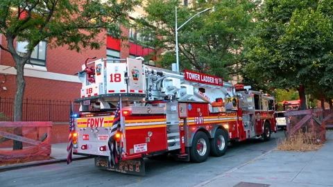 Seagrave 75' Tower Ladder fire truck belonging to New York City Fire Department. Stock Footage 330681412