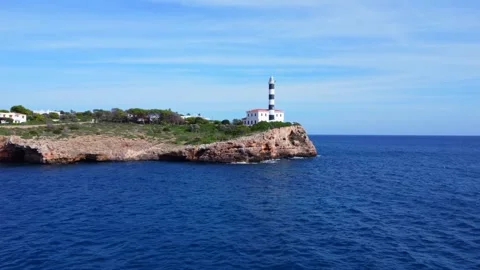 Seagull flying over portocolom lighthouse Stock Footage 296530770