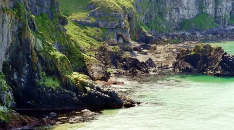 Seagulls at the cliffs in the Carrick-a-Rede area, Ballintoy, Northern Ireland Stock Footage 64208474