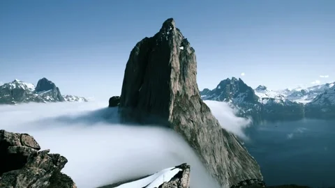 Seagulls Flying Over Clouds and Mountain Peaks Video stock 325329506