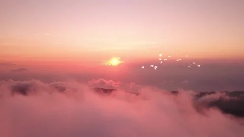 Seagulls Flying Over Clouds at Sunrise Video stock 325329249