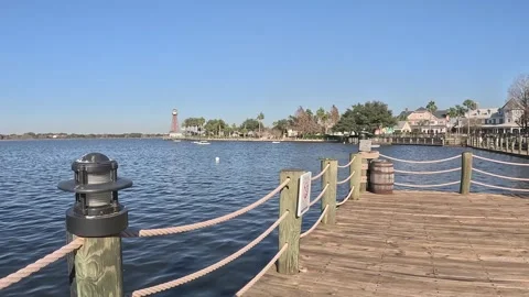 Seagulls flying over dock at Lake Sumter Landing Florida Vídeos de archivo 331435726