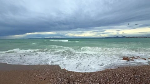 Seagulls Flying Over The Waves Of The Aegean Sea, Flapping Wings In Slow Motion Stock Footage 329247774
