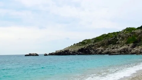 Seagulls flying on the sea. Footage, Seagulls flying on the shore of a rocky sea Stock Footage