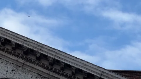 Seagulls try to attack a drone over the Pantheon in Rome Stock Footage 243658186